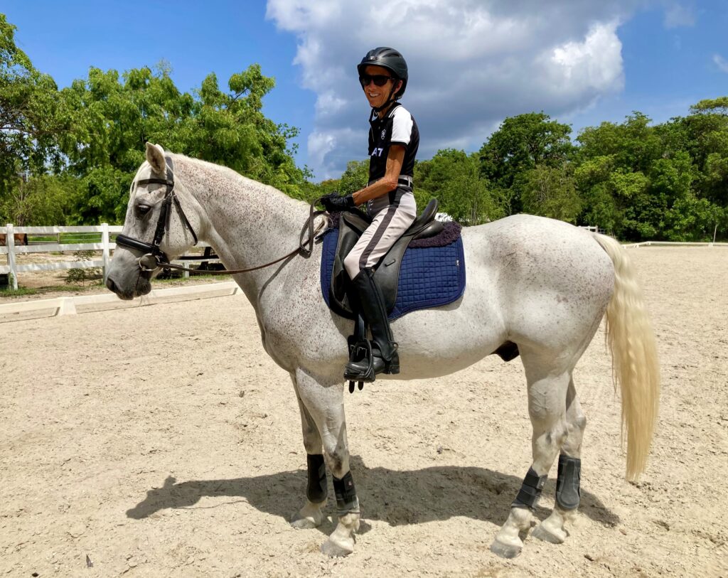 Anne Evans riding Whizz on Grand Cayman Island.