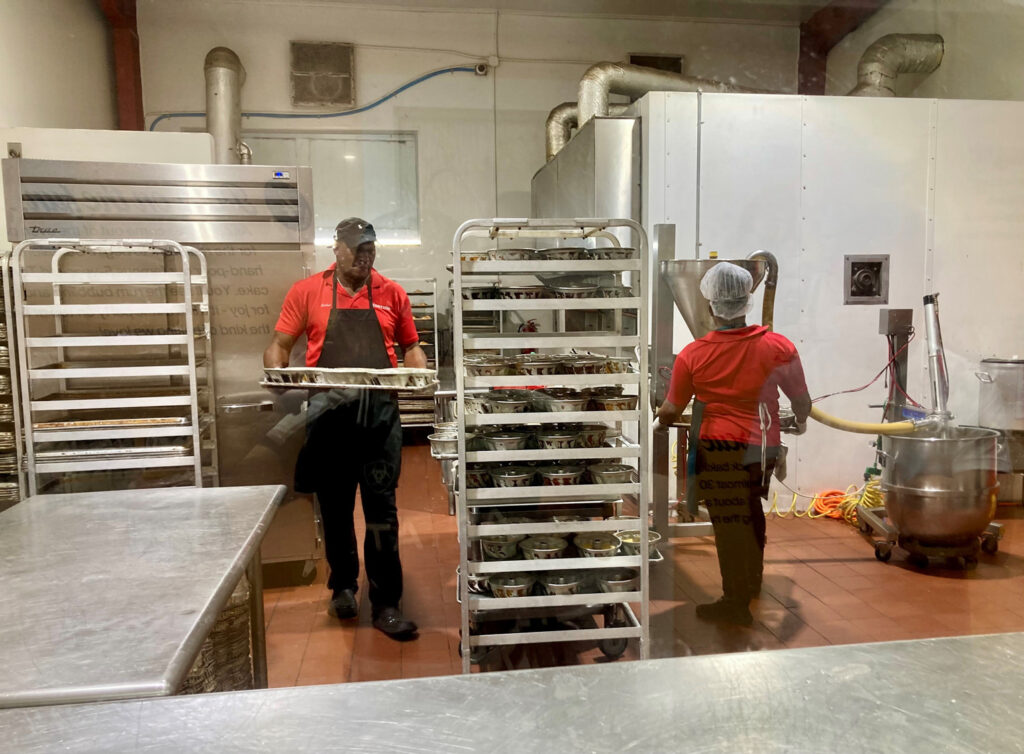 Tortuga Rum Cake bakers at work on Grand Cayman Island.