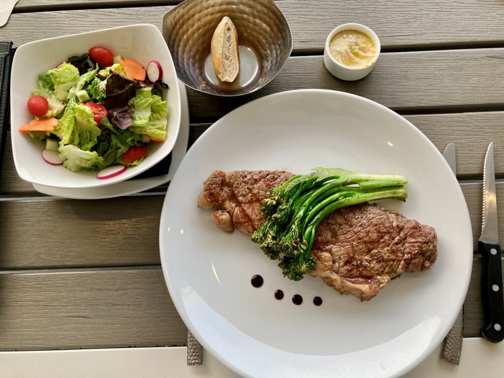 Strip steak entree at the Blue Flame restaurant on Grand Cayman Island.