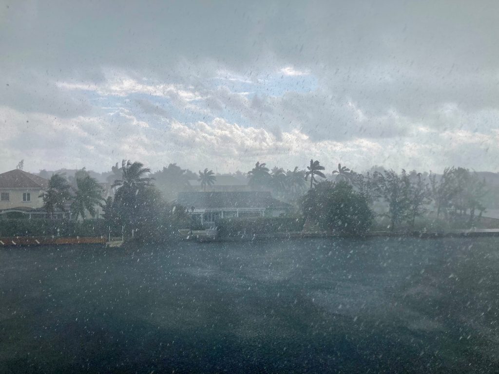 Rain shower on the canal on Grand Cayman Island.